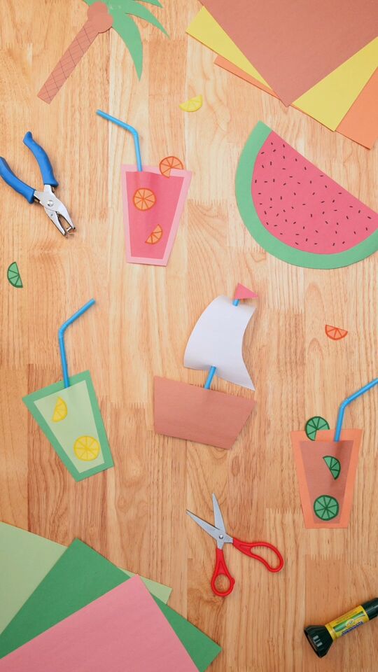 Summer paper craft with drinks, watermelon and a sailboat